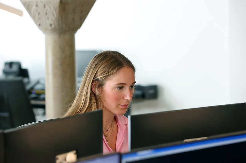 Colleague concentrating behind a monitor