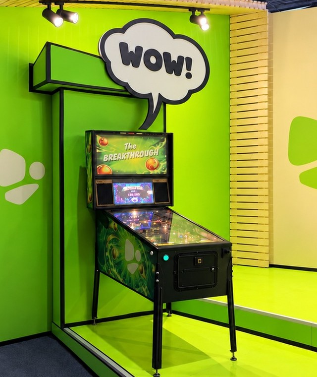 The Breakthrough pinball machine in the CleverMobi trade-show booth