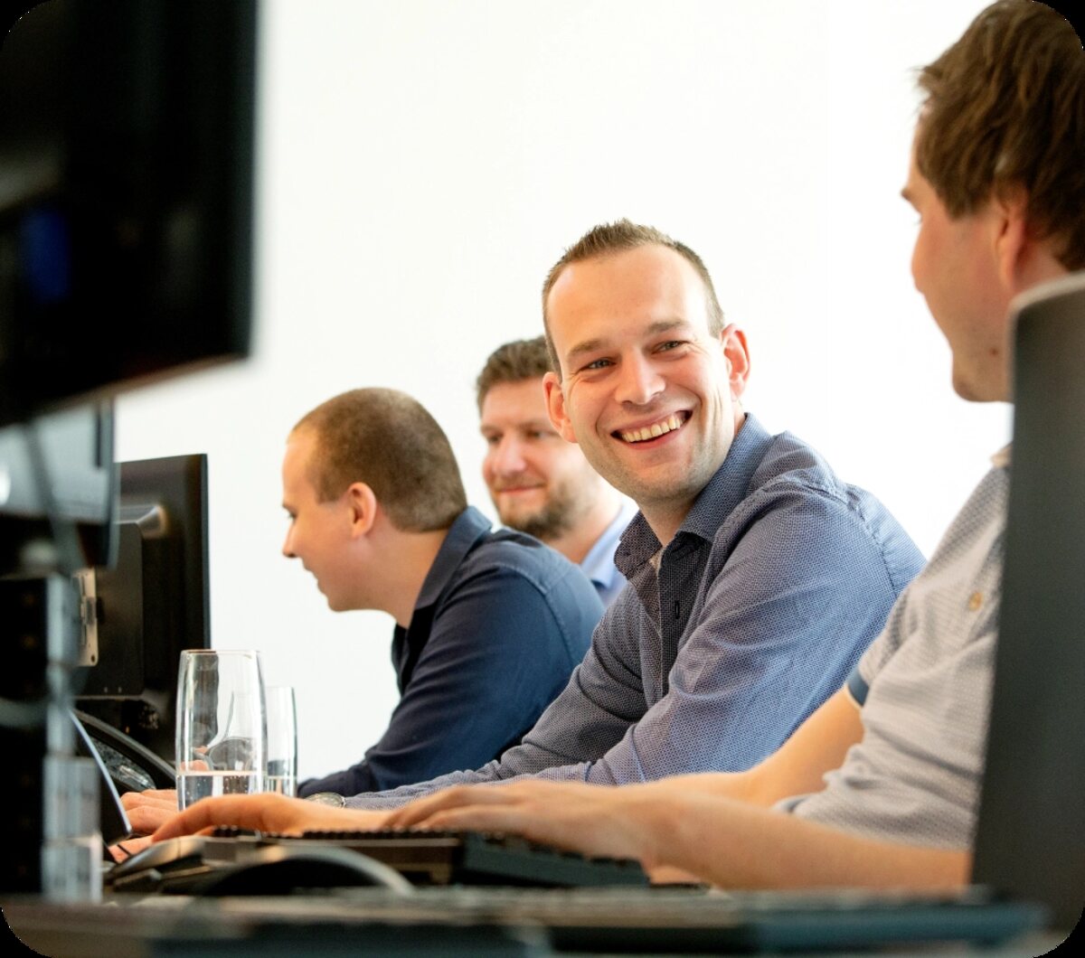 CleverMobi colleagues working at their desks